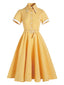 Vestito giallo con cintura scozzese anni '50