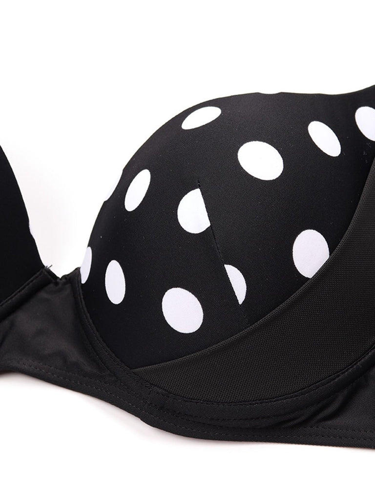 Completo bikini nero a pois con gonna