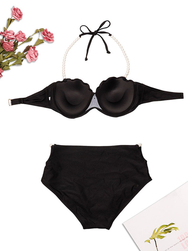 Set bikini nero con perle e conchiglia all'americana